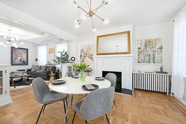 372 Webster Ave, Jersey City, NJ 07307 - dining room with a chandelier, a fireplace, radiator, beamed ceiling, and crown molding
