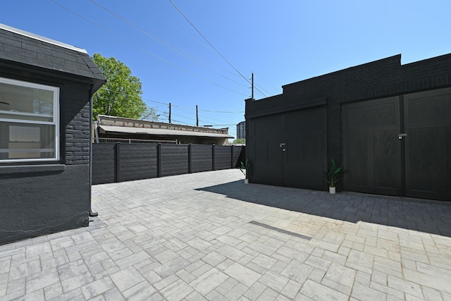 372 Webster Ave, Jersey City, NJ 07307 - fenced backyard with a patio area and an outbuilding