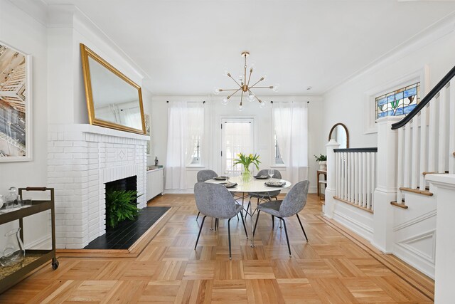 372 Webster Ave, Jersey City, NJ 07307 - dining space with a chandelier, stairway, a fireplace, and crown molding