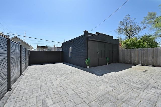 372 Webster Ave, Jersey City, NJ 07307 - fenced backyard with a patio area and a storage shed