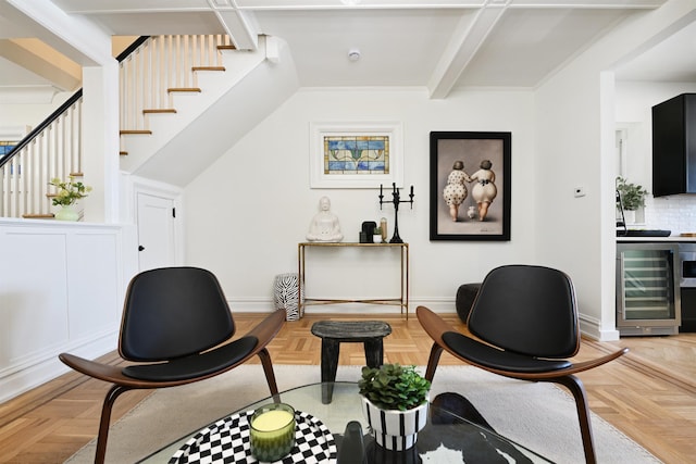 372 Webster Ave, Jersey City, NJ 07307 - living area with wine cooler, stairway, and beamed ceiling