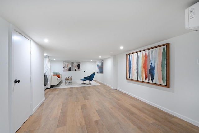 372 Webster Ave, Jersey City, NJ 07307 - unfurnished room featuring recessed lighting, light wood-style floors, and an AC wall unit