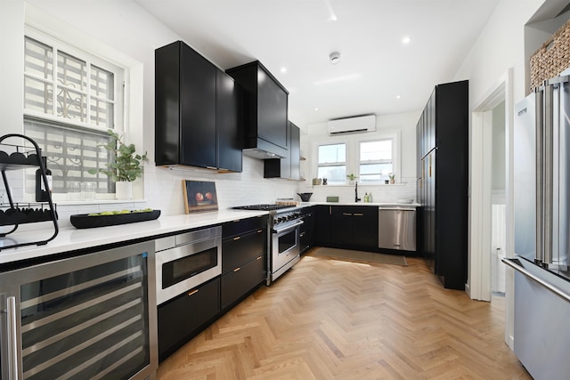 372 Webster Ave, Jersey City, NJ 07307 - kitchen with beverage cooler, dark cabinets, high end appliances, an AC wall unit, and light countertops