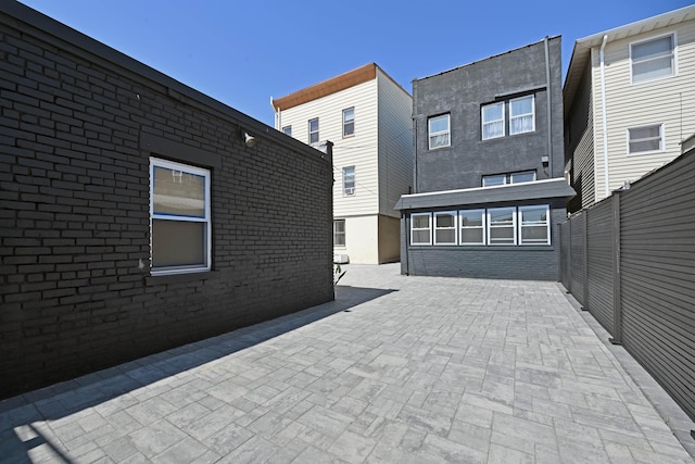 372 Webster Ave, Jersey City, NJ 07307 - back of property featuring a patio area and brick siding