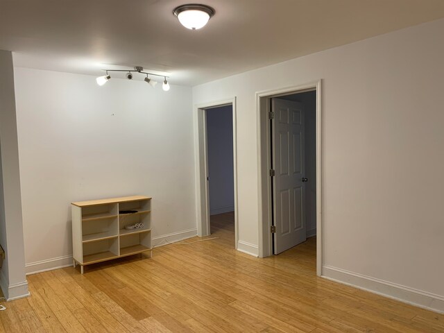 empty room featuring light hardwood / wood-style floors