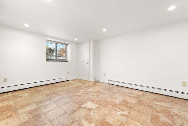 empty room featuring baseboard heating