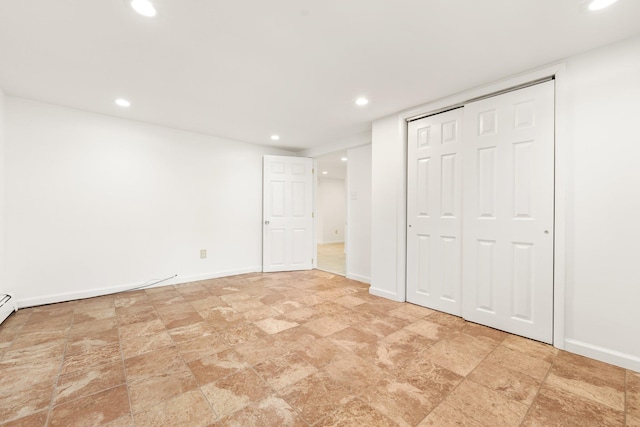 unfurnished bedroom with a closet