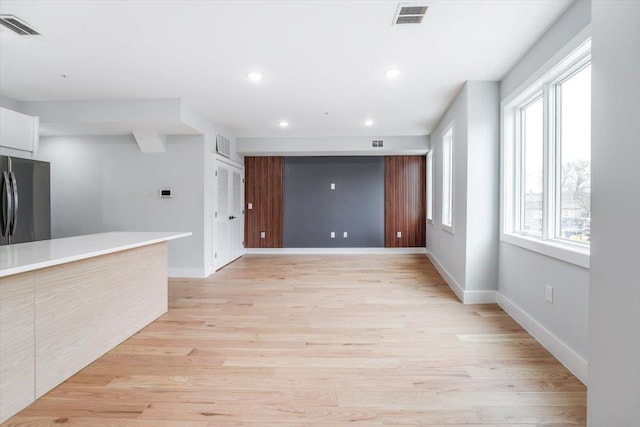 443 Bergen Ave Unit C3, Jersey City, NJ 07304 - unfurnished living room with light wood finished floors, visible vents, and recessed lighting