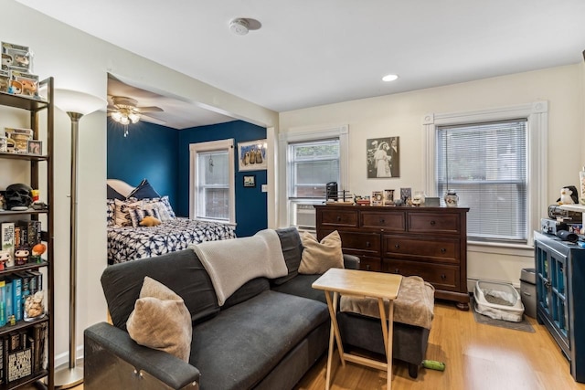 bedroom featuring ceiling fan and light hardwood / wood-style flooring