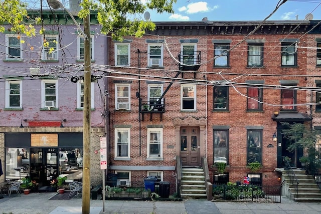 view of front of house with cooling unit