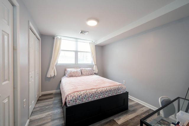 1406 8th St Unit 9, North Bergen, NJ 07047 - bedroom with wood finished floors, baseboards, and a closet