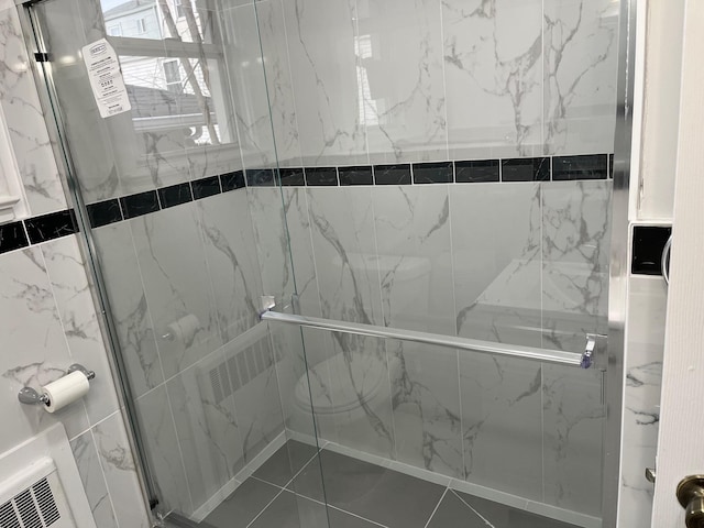 bathroom with an enclosed shower