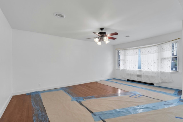 interior space with hardwood / wood-style flooring, plenty of natural light, and ceiling fan