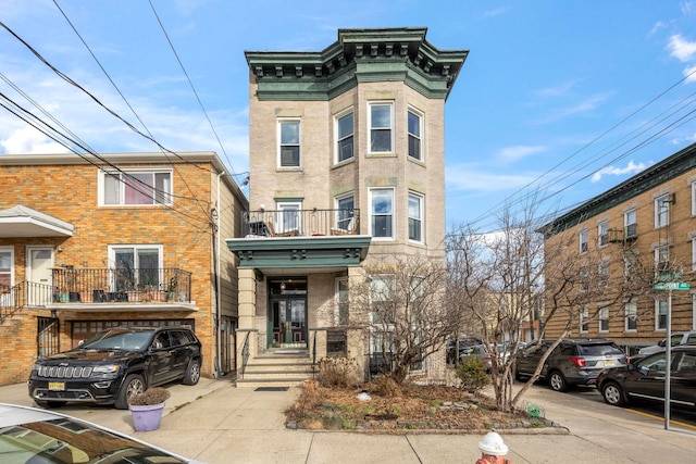 view of front of home featuring brick siding