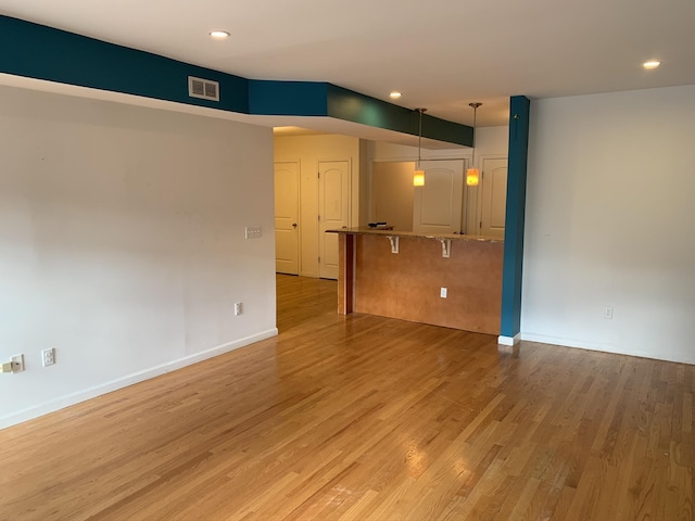 612 Palisade Ave, Jersey City, NJ 07307 - unfurnished room featuring visible vents, light wood-style flooring, recessed lighting, and baseboards