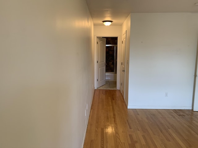 612 Palisade Ave, Jersey City, NJ 07307 - hallway featuring light wood-type flooring and baseboards