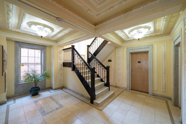 tiled foyer with crown molding