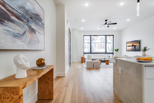 177 Wilkinson Ave Unit 1, Jersey City, NJ 07305 - living room with light wood finished floors, recessed lighting, a ceiling fan, and baseboards