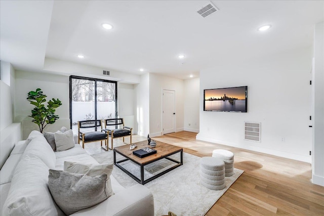 177 Wilkinson Ave Unit 1, Jersey City, NJ 07305 - living area featuring baseboards, recessed lighting, and light wood-type flooring