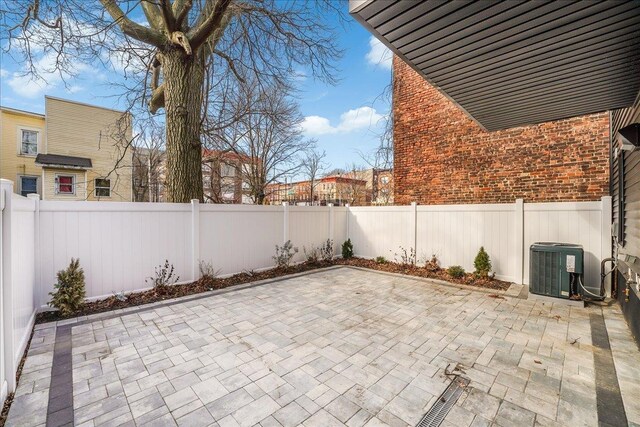 177 Wilkinson Ave Unit 1, Jersey City, NJ 07305 - fenced backyard with a patio and central air condition unit