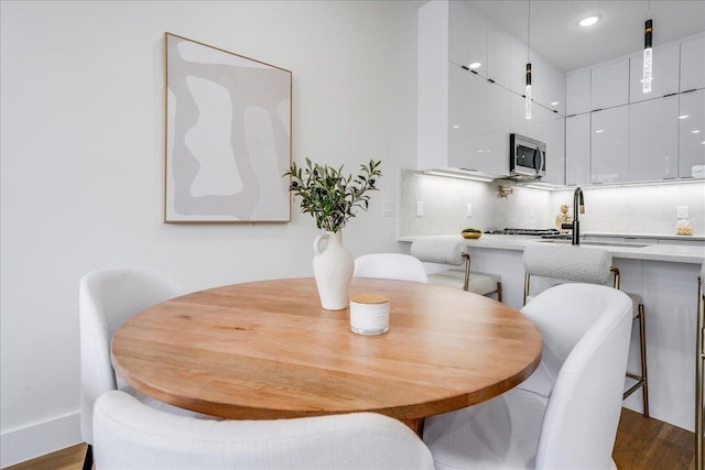 177 Wilkinson Ave Unit 1, Jersey City, NJ 07305 - dining area with dark wood-type flooring and recessed lighting
