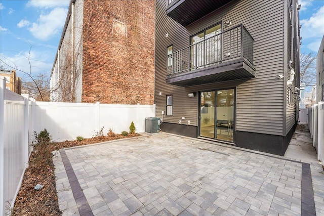 177 Wilkinson Ave Unit 1, Jersey City, NJ 07305 - fenced backyard featuring a balcony, a patio, and central AC