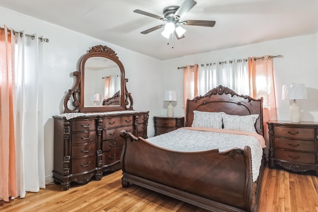 131 Iozia Ter, Elmwood Park, NJ 07407 - bedroom with ceiling fan and light wood-style flooring