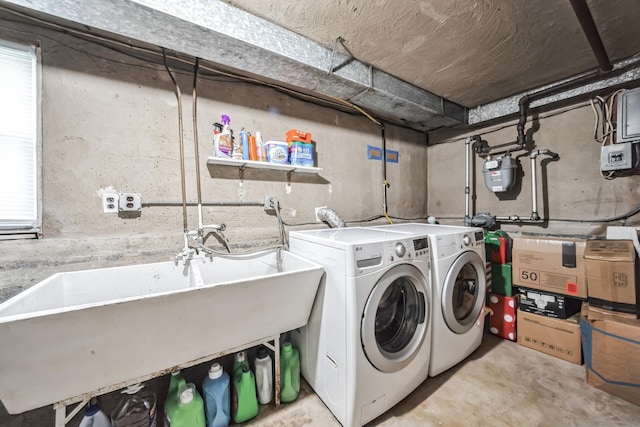 131 Iozia Ter, Elmwood Park, NJ 07407 - clothes washing area with washer and clothes dryer, a sink, and laundry area