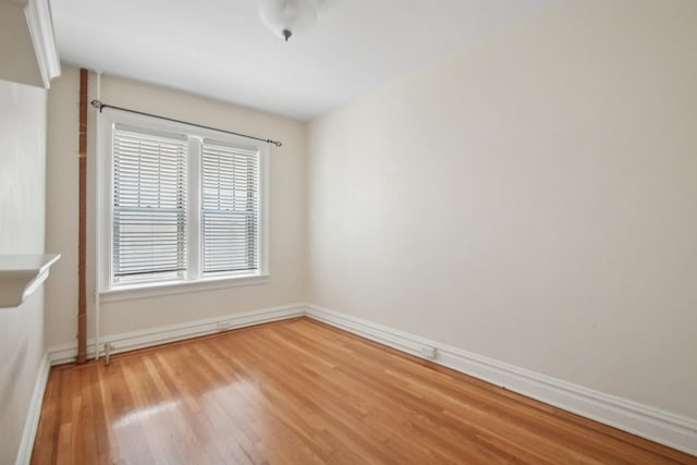 1000 Hudson St Unit 209, Hoboken, NJ 07030 - unfurnished room featuring wood finished floors and baseboards