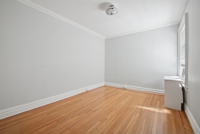 1000 Hudson St Unit 209, Hoboken, NJ 07030 - empty room with crown molding and light wood-style flooring