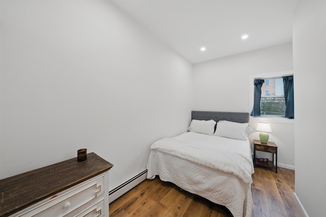 3809 Kennedy Blvd, Union City, NJ 07087 - bedroom with a baseboard radiator, recessed lighting, light wood finished floors, and baseboards