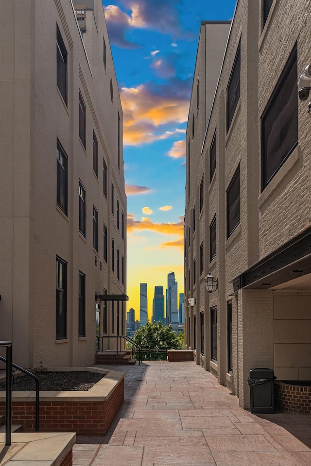 518 Gregory Ave Unit A213, Weehawken, NJ 07086 - property at dusk featuring a view of skyline