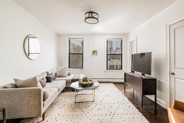 living room with hardwood / wood-style floors and a baseboard radiator