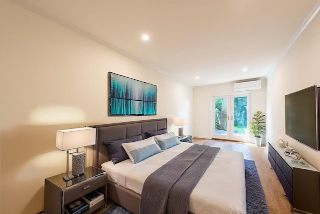 224 Park Ave Unit 1, Hoboken, NJ 07030 - bedroom with a wall mounted air conditioner, access to outside, crown molding, light wood-type flooring, and recessed lighting