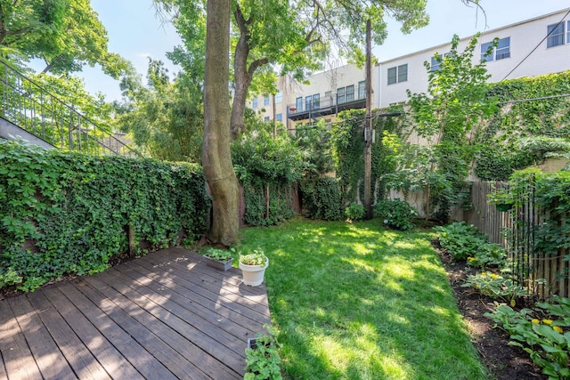 224 Park Ave Unit 1, Hoboken, NJ 07030 - fenced backyard featuring a deck