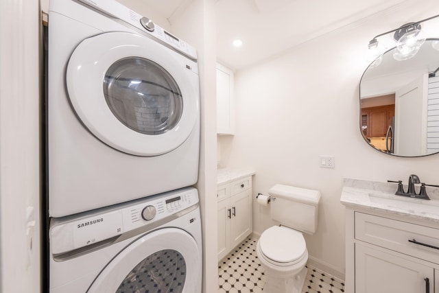 224 Park Ave Unit 1, Hoboken, NJ 07030 - bathroom with stacked washer / dryer and vanity