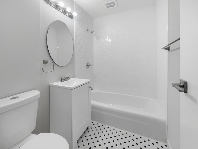 bathroom with visible vents, shower / tub combination, vanity, and toilet