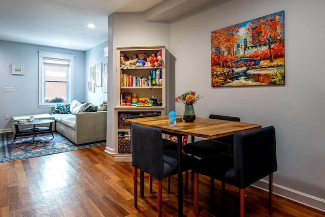 123 Willow Ter, Hoboken, NJ 07030 - dining room with wood finished floors, recessed lighting, and baseboards