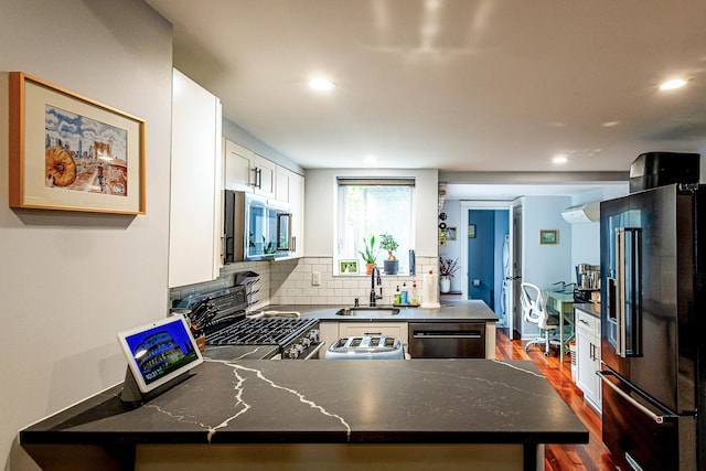 123 Willow Ter, Hoboken, NJ 07030 - kitchen with high quality fridge, a sink, stainless steel microwave, dishwashing machine, and gas range oven