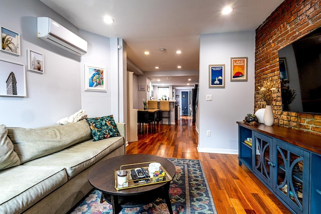 123 Willow Ter, Hoboken, NJ 07030 - living room featuring a wall mounted air conditioner, wood finished floors, recessed lighting, and baseboards