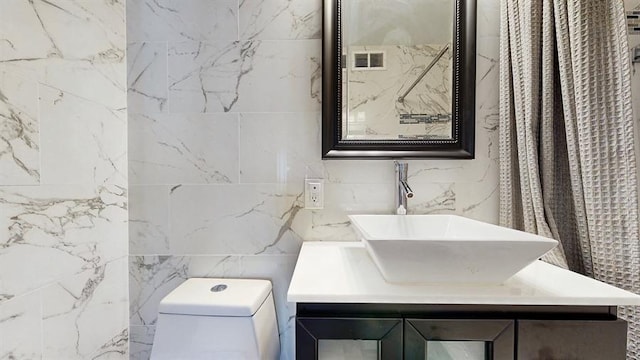 100 Manhattan Ave Unit 1912, Union City, NJ 07087 - bathroom with visible vents, toilet, and vanity