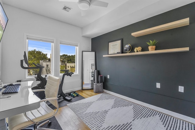 936 Pavonia Ave # 3A, Jersey City, NJ 07306 - home office featuring baseboards, visible vents, a ceiling fan, and light wood finished floors