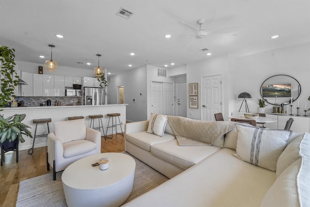 936 Pavonia Ave # 3A, Jersey City, NJ 07306 - living area featuring recessed lighting, visible vents, and light wood-type flooring