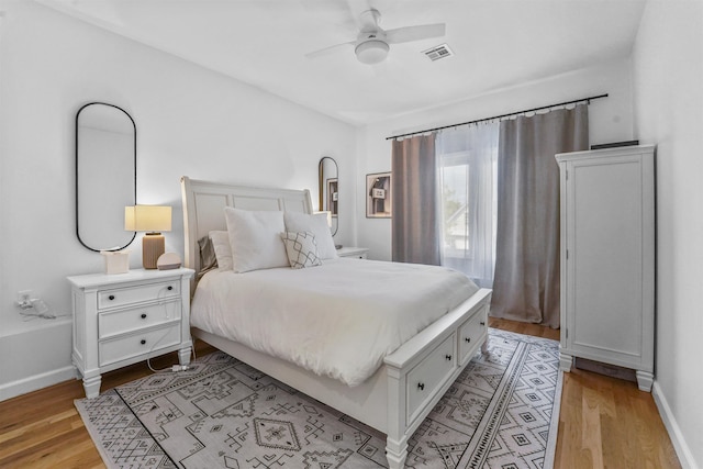 936 Pavonia Ave # 3A, Jersey City, NJ 07306 - bedroom featuring baseboards, visible vents, ceiling fan, and light wood-style floors