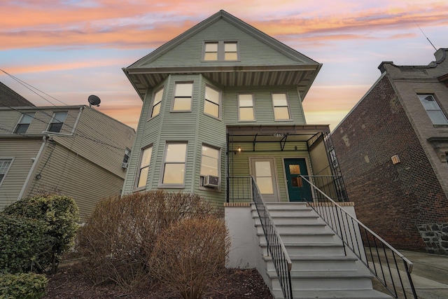 view of front of home with cooling unit