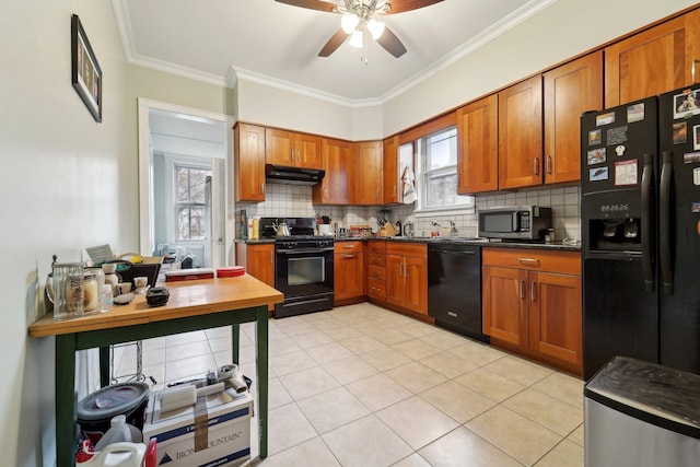 kitchen with dark countertops, a ceiling fan, black appliances, and brown cabinetry