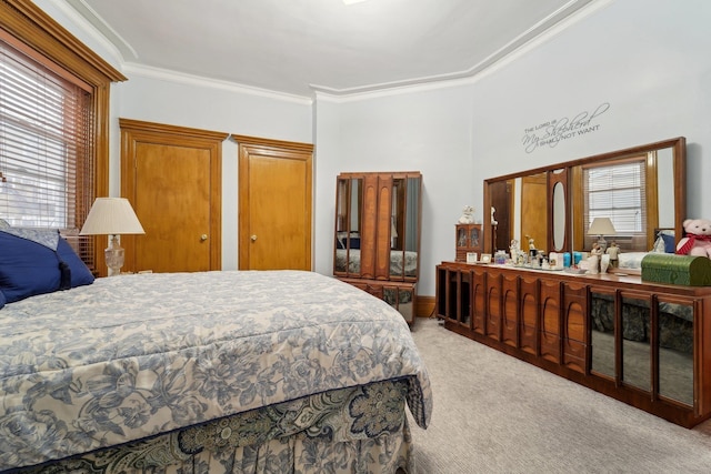 bedroom with light carpet and ornamental molding