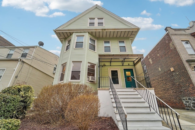 view of front of home featuring cooling unit