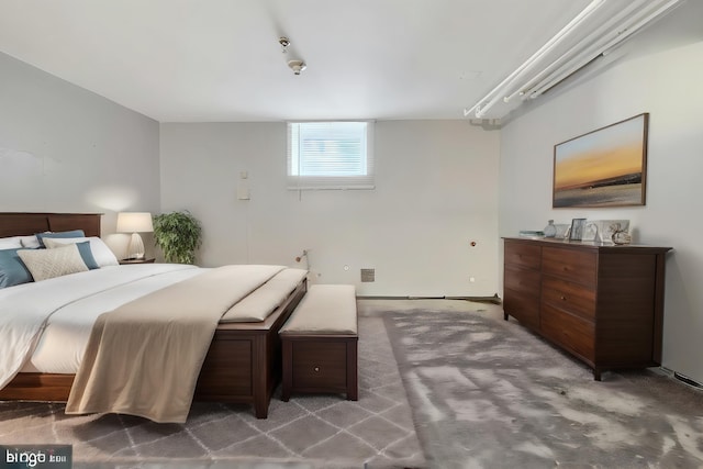 bedroom with light carpet