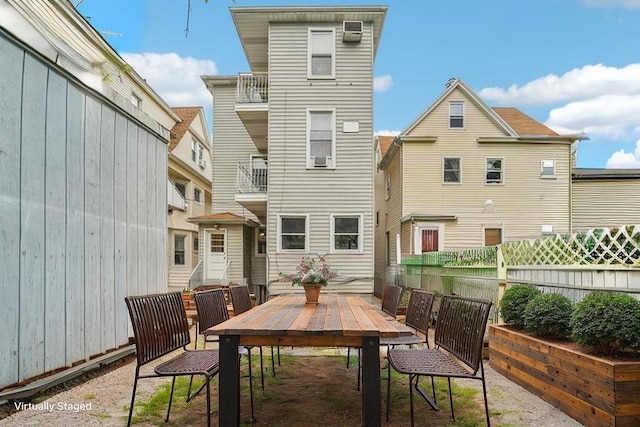 37 47th St, Weehawken, NJ 07086 - back of house featuring outdoor dining space and fence